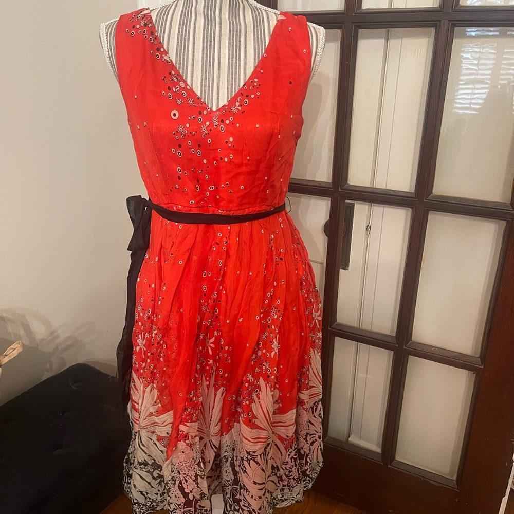 Red Sleeveless V-Neck Midi Dress with Floral Hem and Black Waist Tie